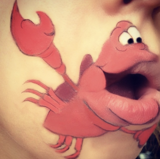 Illustration for article titled Girl transforms her mouth into cute famous characters with just makeup